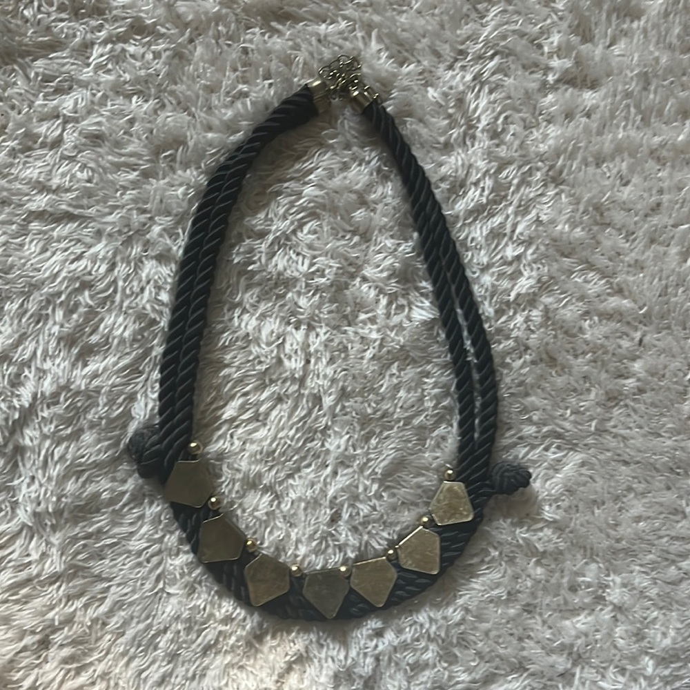 black rope necklace with gold decals